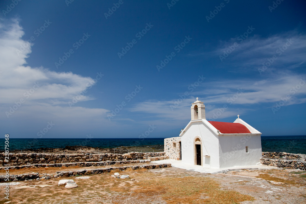 Greek Crete coastline with church and cliffs