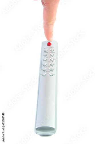 Push power batton on remote control. photo