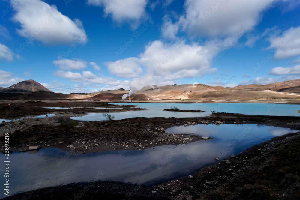 Blue lagoon in front of a geothermal powerplant
