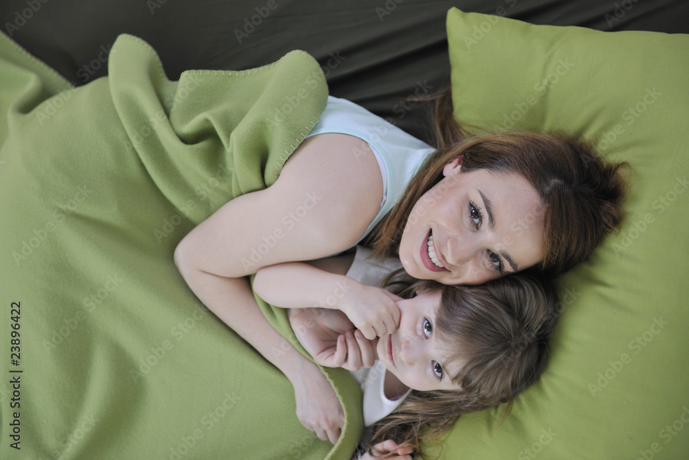 happy family relaxing in bed happy family relaxing in bed