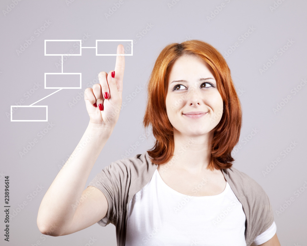 Red-haired businesswoman show abstract table in air.