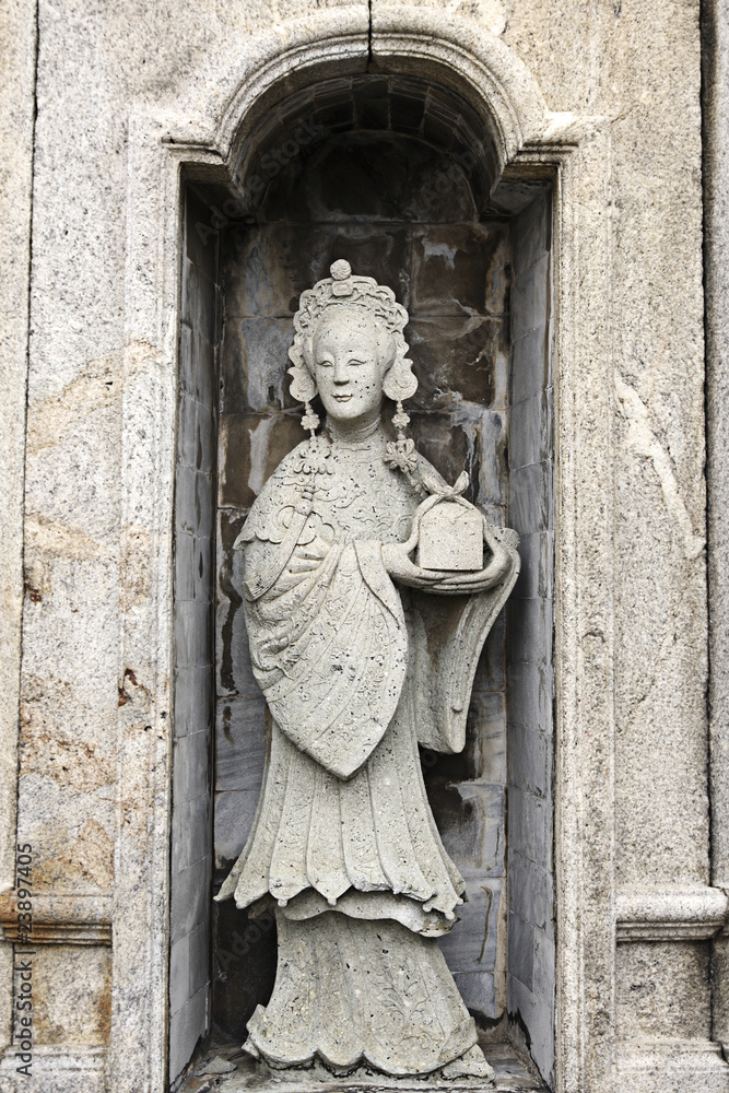 Chinese woman sculpture on the rock