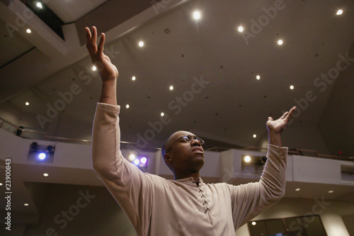 Man Worshipping In Church