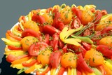salad of tomatoes and cut multicolor paprica