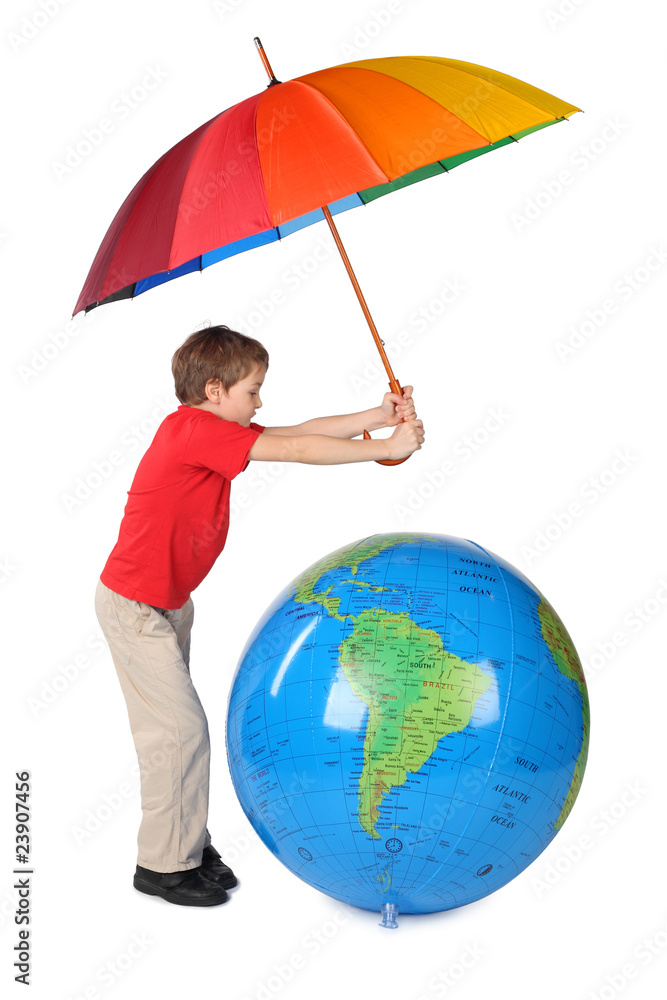 boy in red shirt with multicolored umbrella and inflatable globe boy in red shirt with multicolored umbrella and inflatable globe