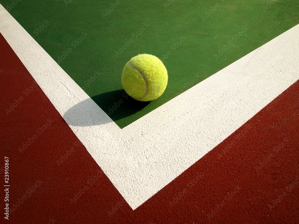 Tennis ball and tennis court
