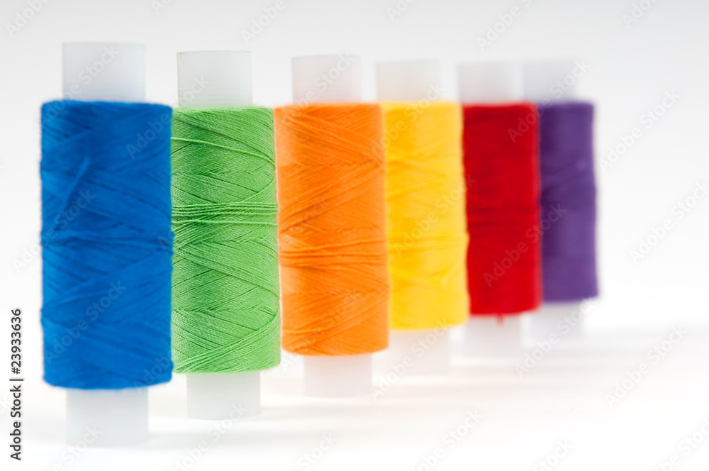 Set of sewing threads on white backgrounds Set of sewing threads on white backgrounds