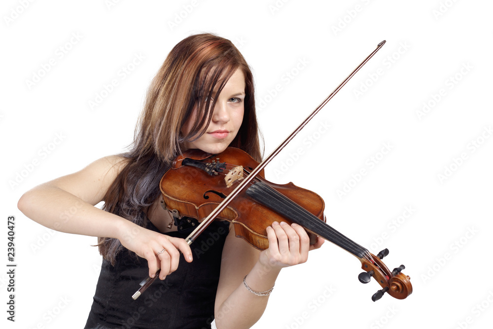 Young woman play the violin isolated in white background