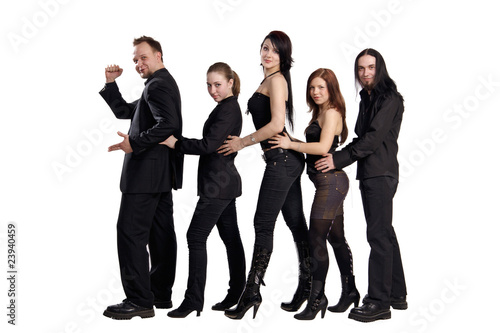 Group of young men and women like a locomotion isolated