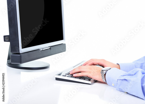 Businessman is working on a glossy laptop