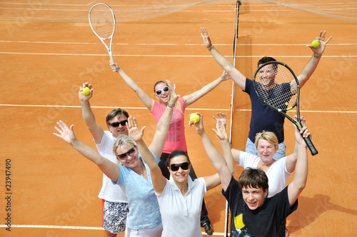 Happy family on the court