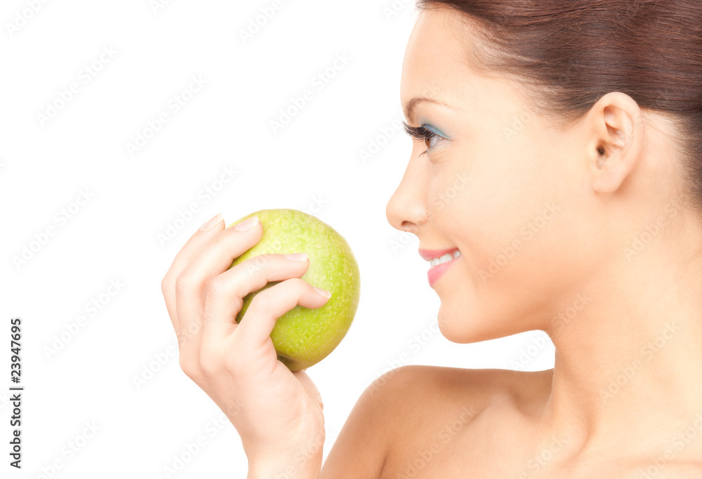 young beautiful woman with green apple young beautiful woman with green apple