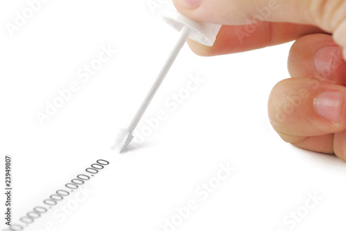 Erasing zeros with correction fluid on white background.