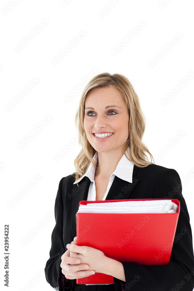 A confident businesswoman holding a red file A confident businesswoman holding a red file
