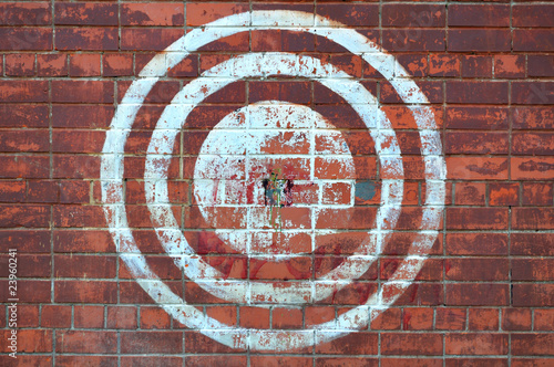 Target on the red brick wall. Urban style.