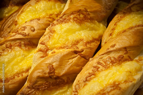 Fresh, hot baguettes with cheese.