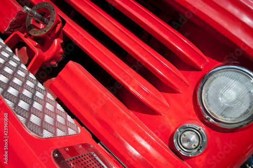 Old vintage red fire fighting truck.