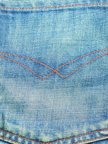 Denim background. Jeans back pocket.