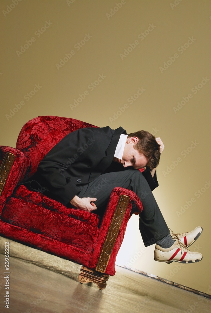 Man Sitting On A Chair Man Sitting On A Chair