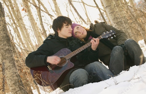 Couple enjoying the guitar together