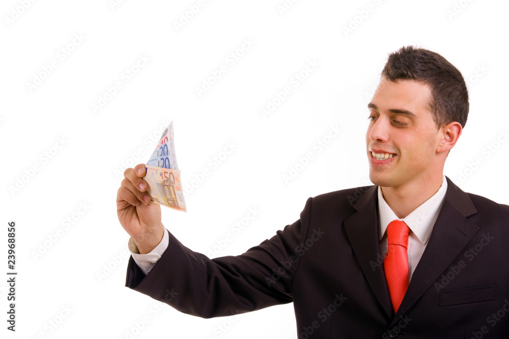 Happy young business man with money, over white background Happy young business man with money, over white background
