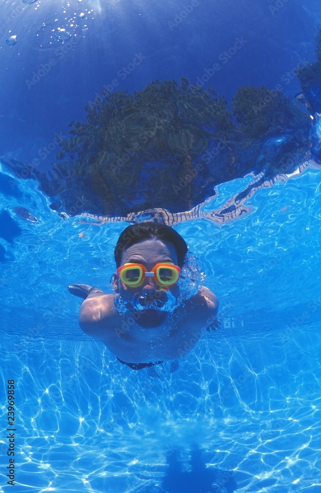 Man With Goggles In Swimming Pool