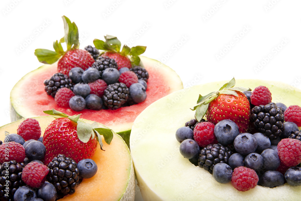 Berries in melon bowls Berries in melon bowls