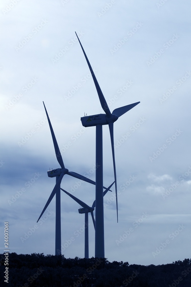 aerogenerator electric windmill over cloudy sky