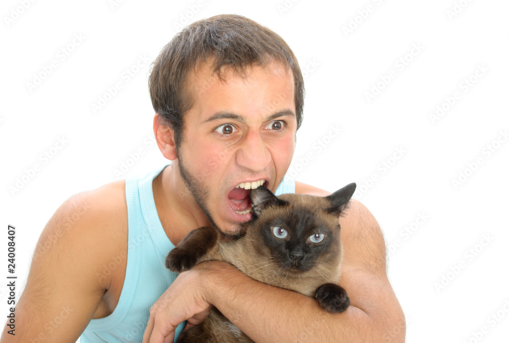 Man bites for ear of cat