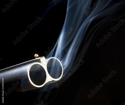 smoking double barrel shotgun