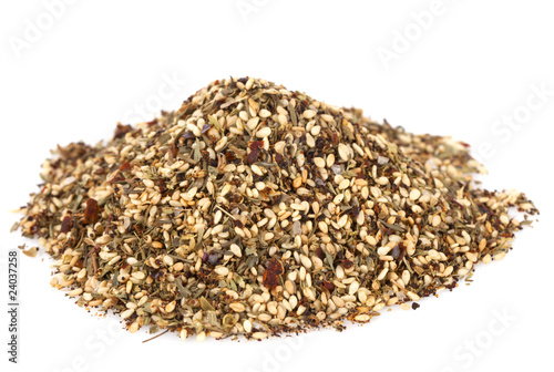 Zaatar-  a blend of herbs, sesame seeds and salt in pile on whit