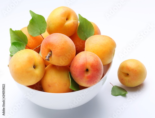 Crockery with mellow apricots.