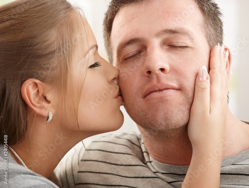 Vászonkép Affectionate kiss on cheek