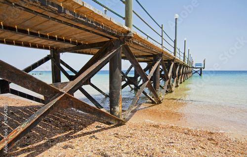 Wooden jetty on a tropical beach