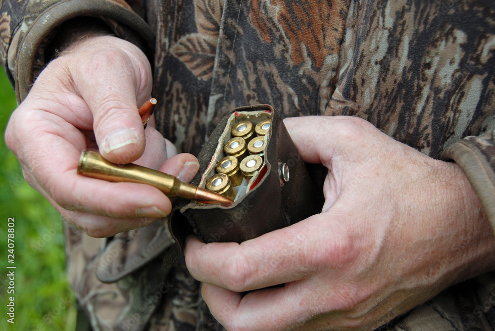 Fototapeta premium hunter with bullets