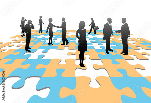 Jigsaw puzzle pieces business people team solution