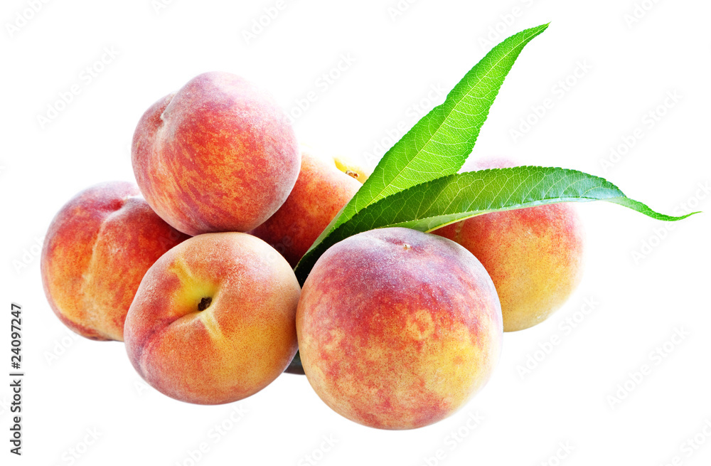 Peaches with green leaf isolated on white. Peaches with green leaf isolated on white.