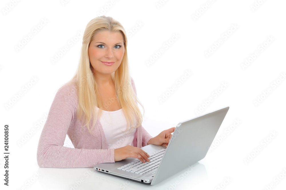 Young pretty office woman working on laptop computer Young pretty office woman working on laptop computer