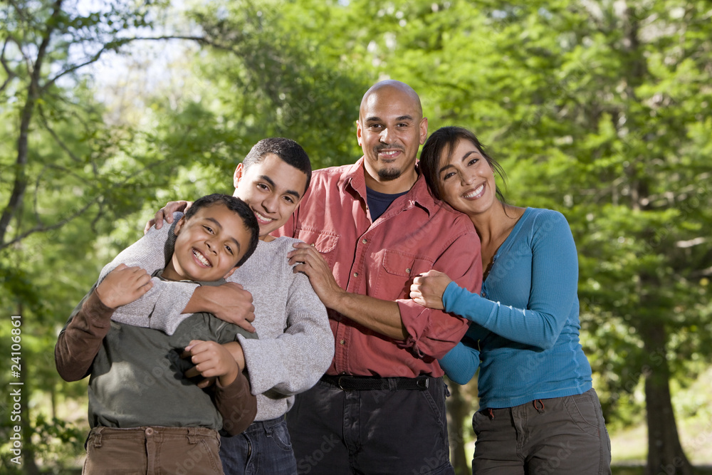Portrait of Hispanic family with two boys outdoors Portrait of Hispanic family with two boys outdoors