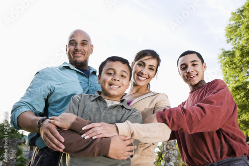 Portrait of Hispanic family outdoors