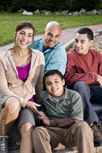 Portrait of Hispanic family outdoors