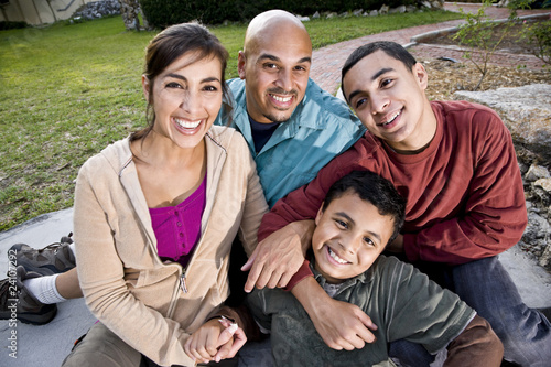 Portrait of Hispanic family outdoors