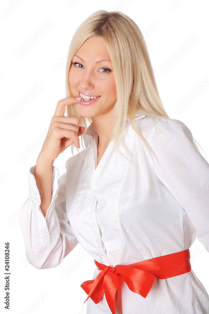 Young smiling blonde in a white shirt Young smiling blonde in a white shirt