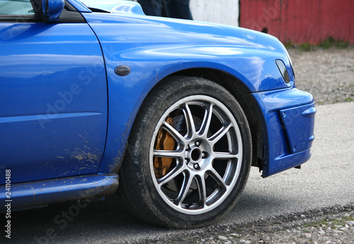 Blue sport car detail © Nikita Zabellevich