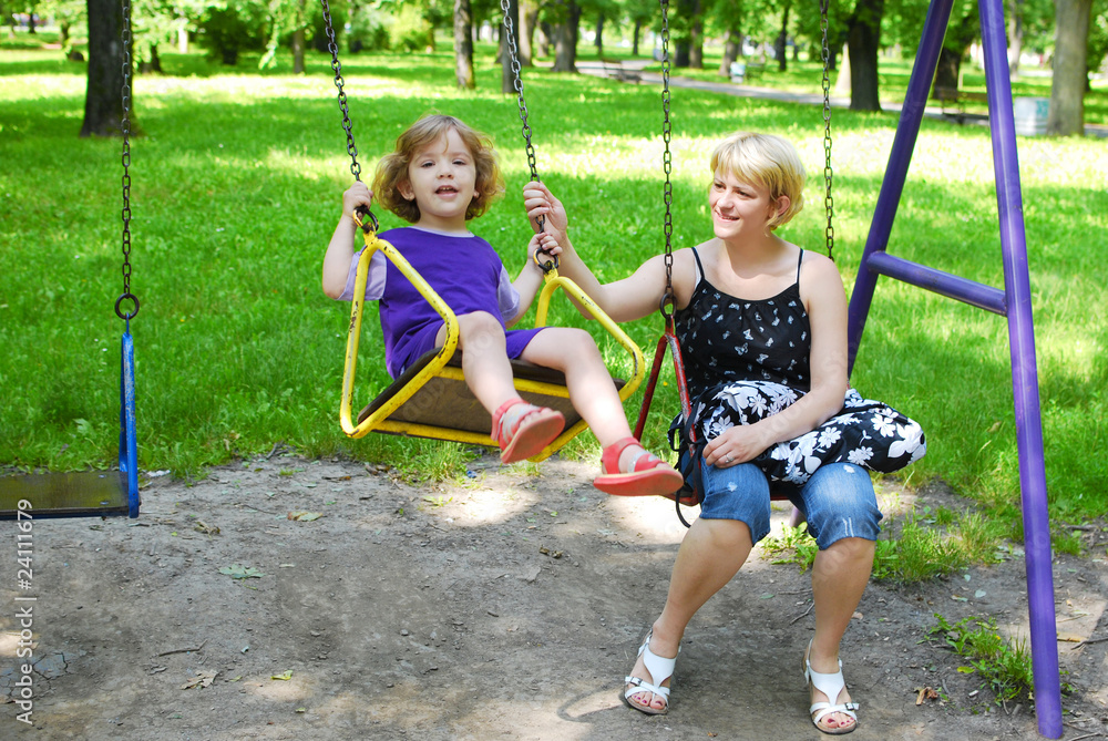 mother and daughter in the playground mother and daughter in the playground