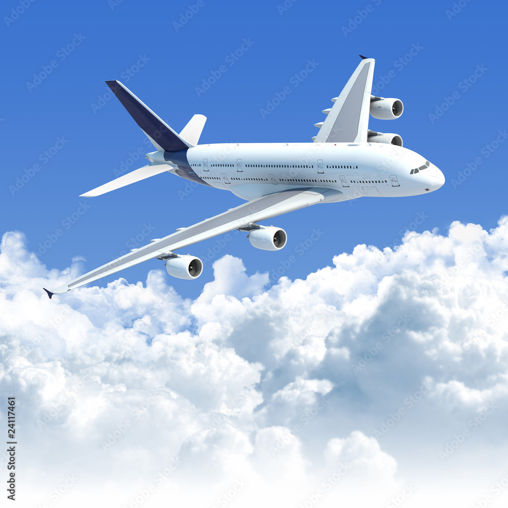 Naklejka premium samolot lecący nad chmurami