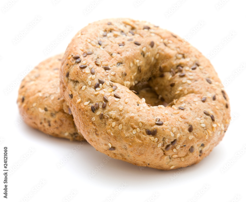 two multigrain bagels; isolated on white;