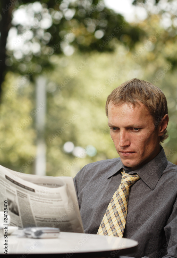 Fototapeta premium businessman reading newspaper
