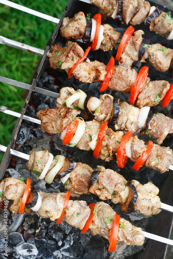 kebab grilled with vegetables on metal skewers kebab grilled with vegetables on metal skewers