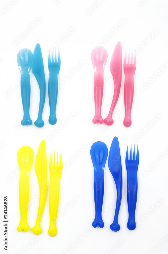 Plastic knife ,fork, spoon on white background
